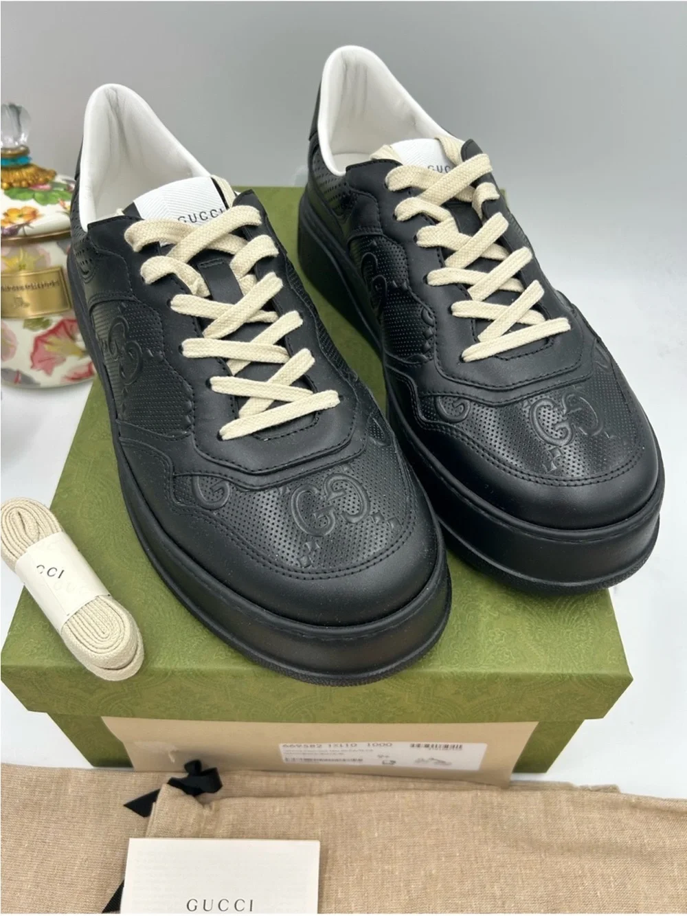 Men’s Gucci, Gigi embossed leather sneakers size 9.5 it’s 10.5 US made in Italy